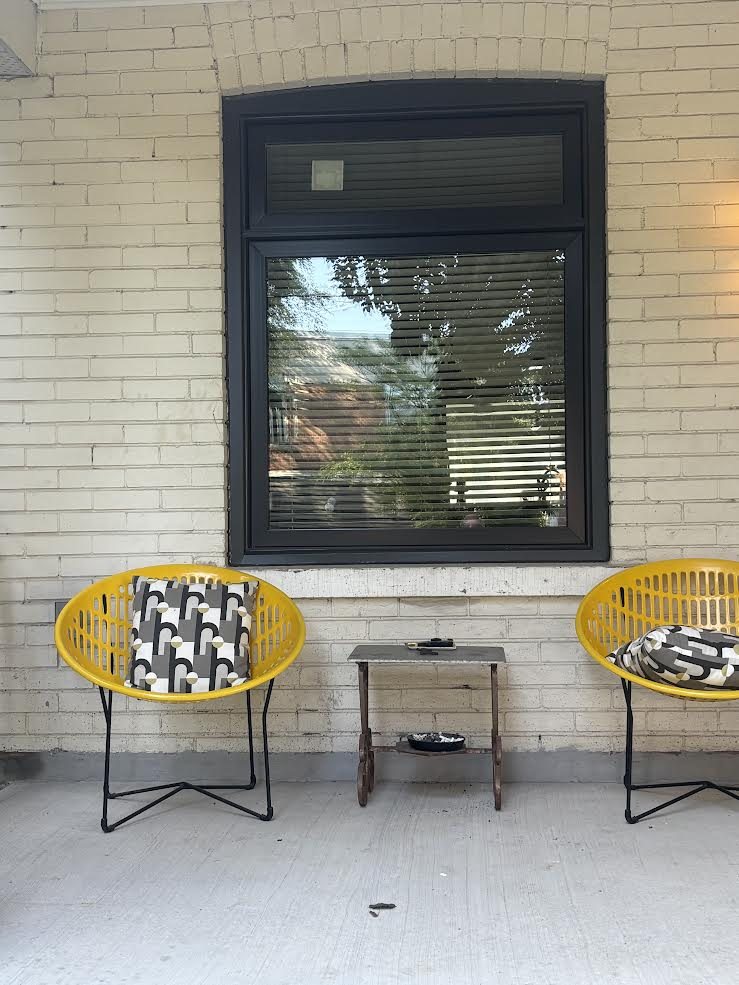 Real WDC project: black picture window on a porch with brick arch
