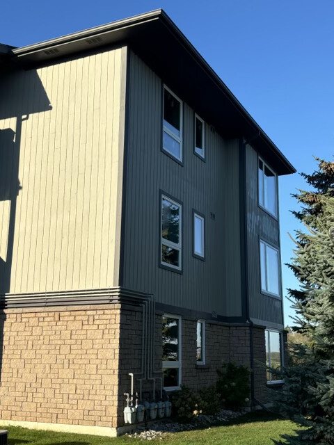 Real WDC project: townhouse side elevation with new white windows